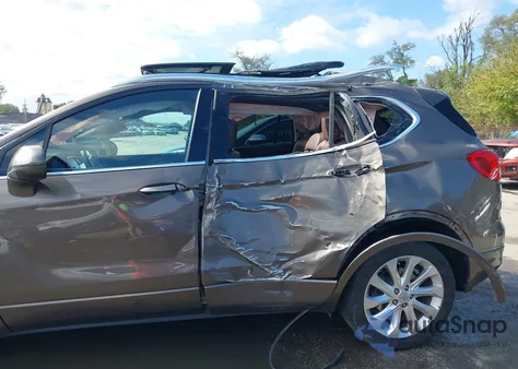 2017 Buick Envision Premium Ii z USA, uszkodzony, nr VIN LRBFXFSXXHD098122